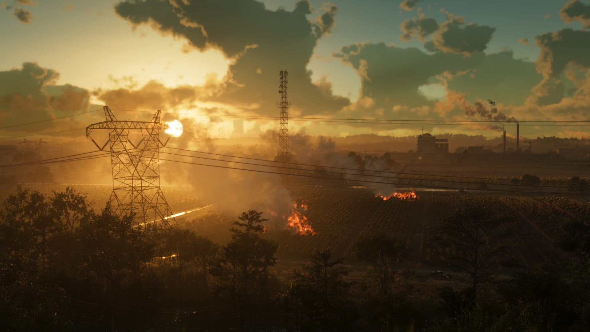 Sunset over the flare stacks and power lines of Ambrosia