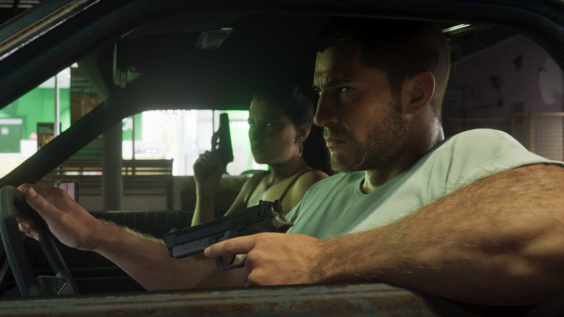 Jason driving with Lucia armed in the passenger seat