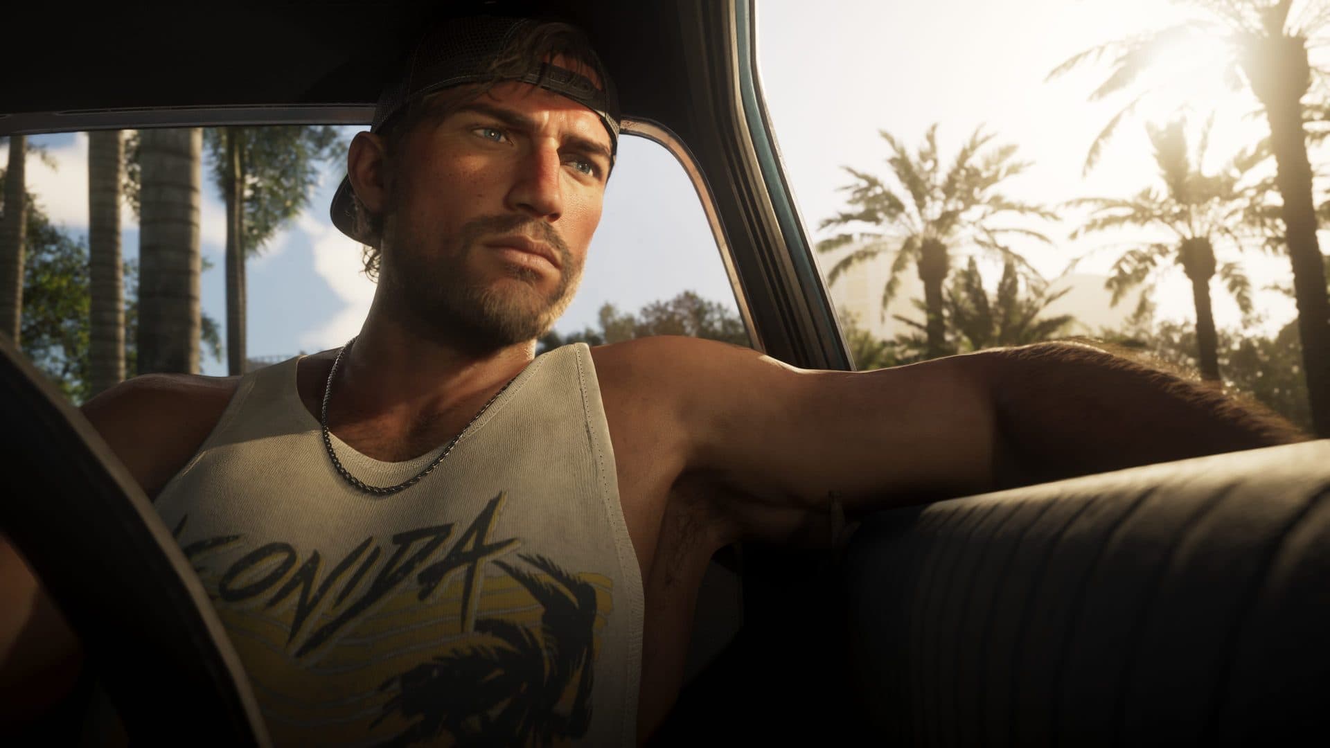 Jason Duval at the wheel, palms through the window