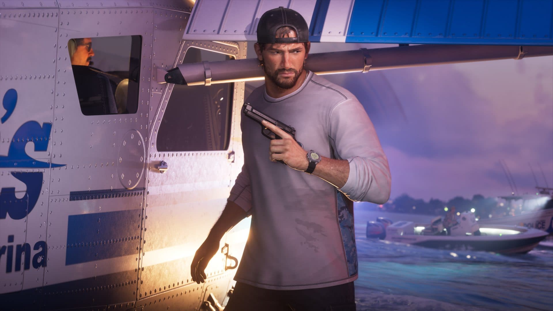 Jason with a pistol raised beside a marina building