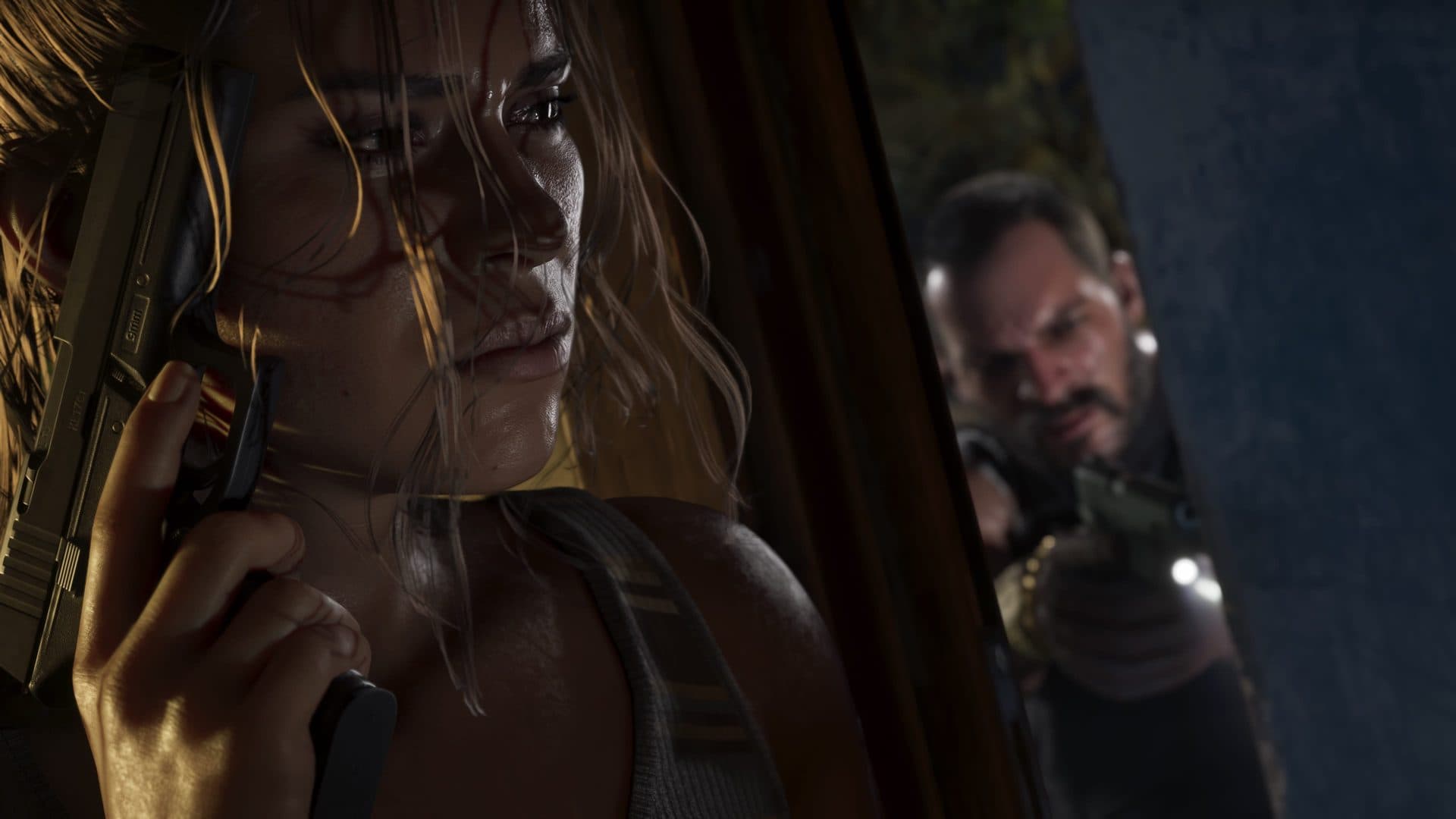 Lucia at close quarters at night, a pistol levelled between them
