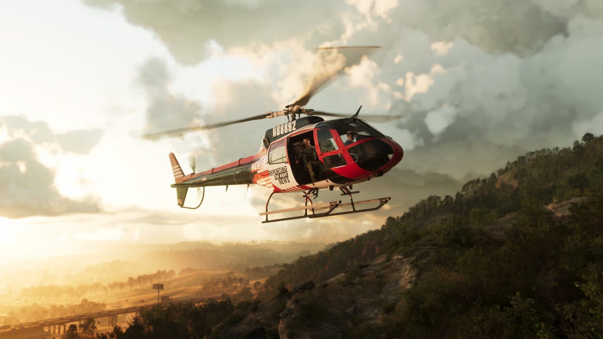 A helicopter over the hills of Mount Kalaga at sunset