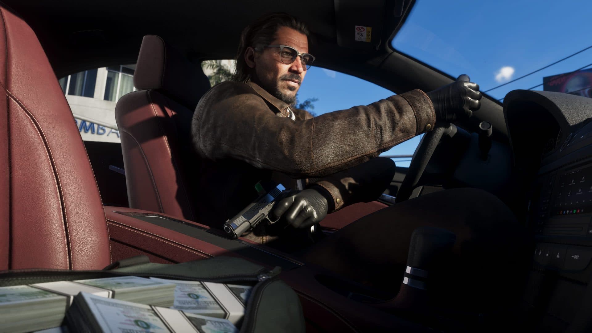 Raul Bautista at the wheel with bundles of cash on the seat