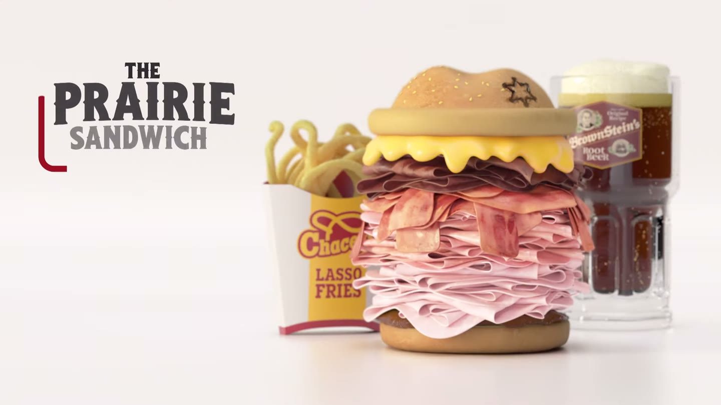 The end card of an in-game advert reading The Prairie Sandwich, with a carton of Lasso Fries and a glass of BrownStein's Root Beer