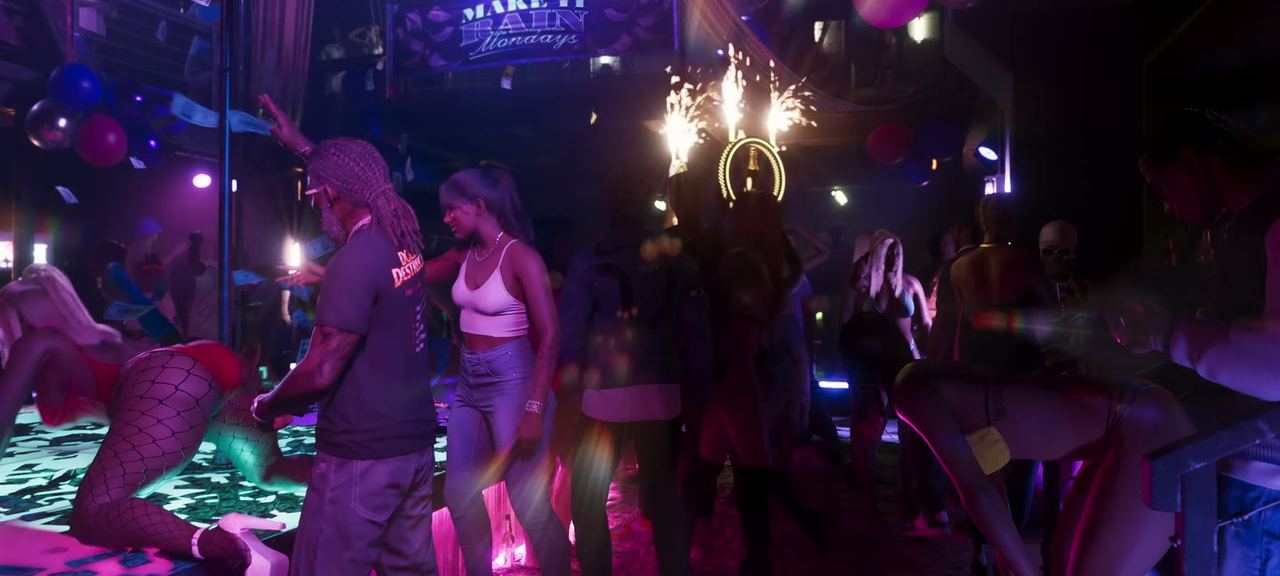 Club interior, bodies and light.