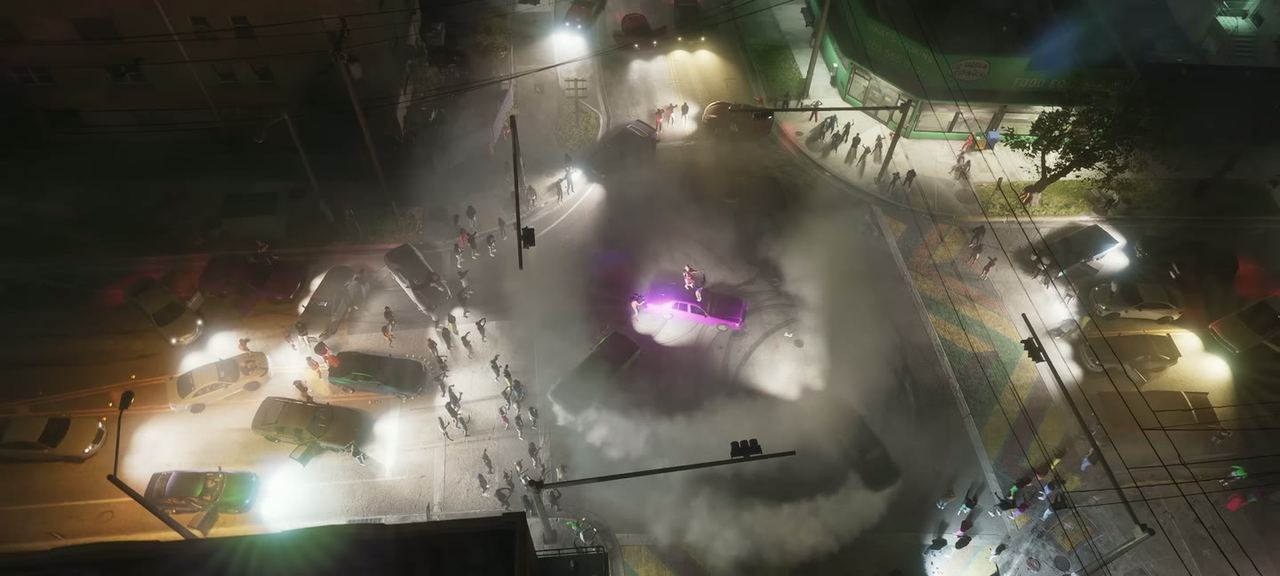 Aerial of a dump truck and a car park, captioned by the in-game feed.