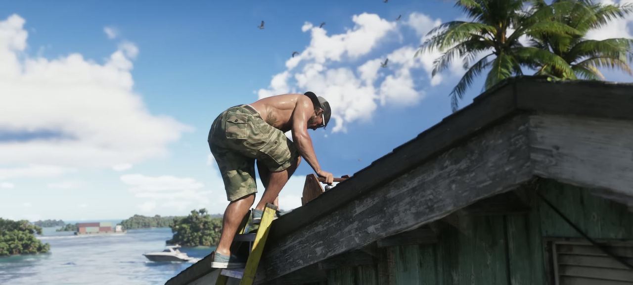 Somebody working on the roof of the stilt house.