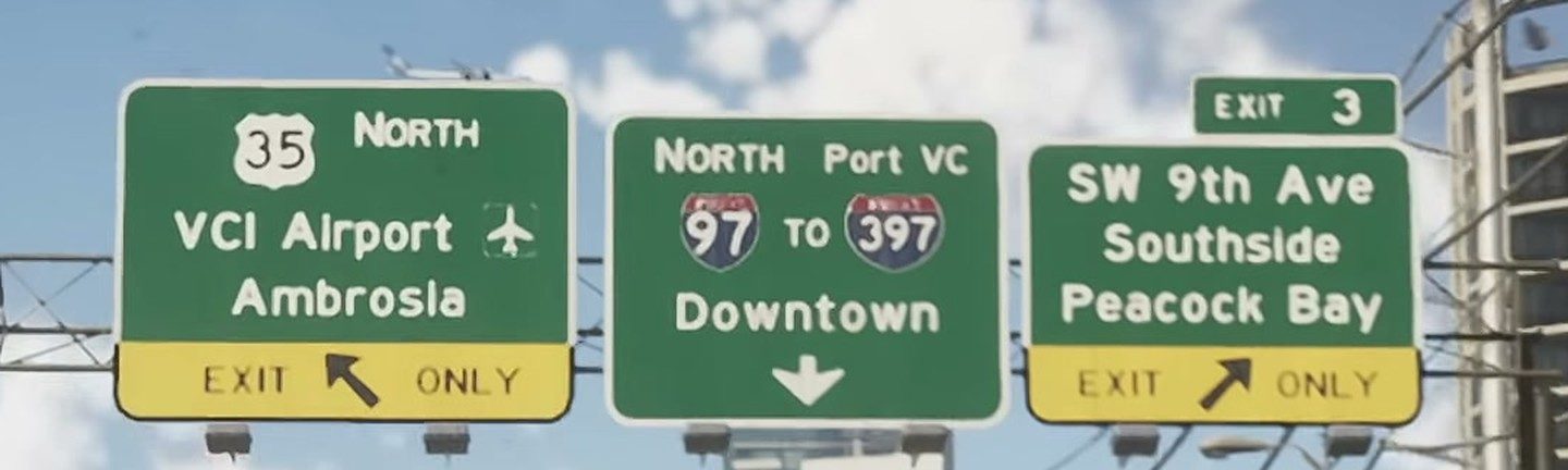 Overhead highway signs reading VCI Airport and Ambrosia